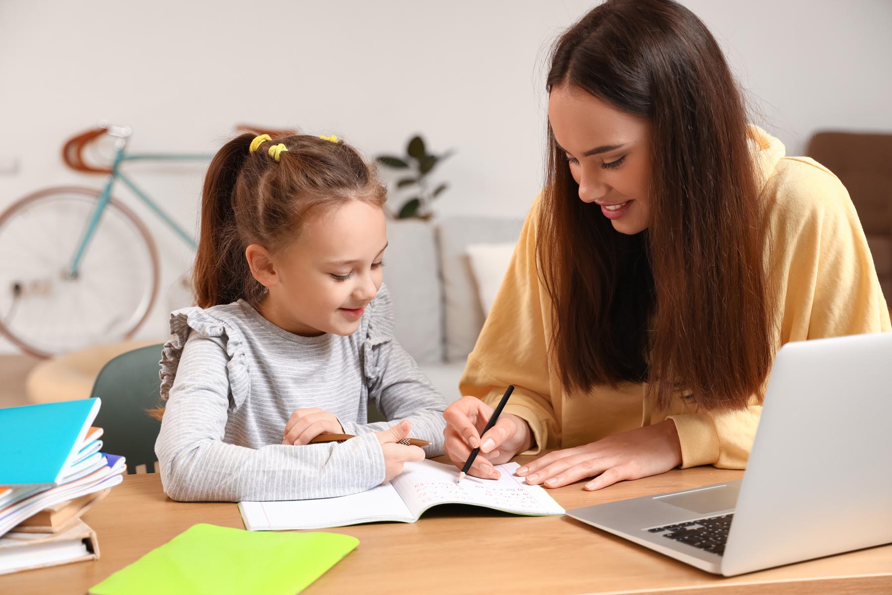 Tutor helping student with homework